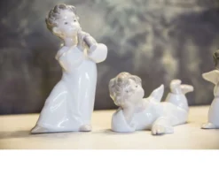 Angioletto con flauto porcellana Lladro'