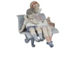 Bimbi sulla panchina porcellana Lladro'