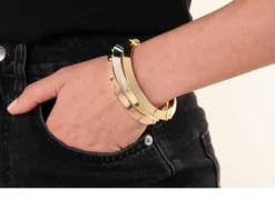 Bracciale rigido triangoli in bronzo rosè a tubo triangolare Unoaerre
