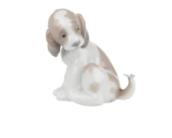 Cane con farfalla porcellana Lladro'