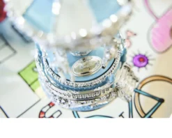 Carillon giostra dei cavalli celeste – Il regalo perfetto per nascita e battesimo