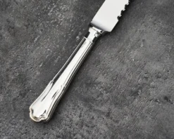 Coltello panettone argento in stile barocchino usato ricondizionato Zanolli vintage