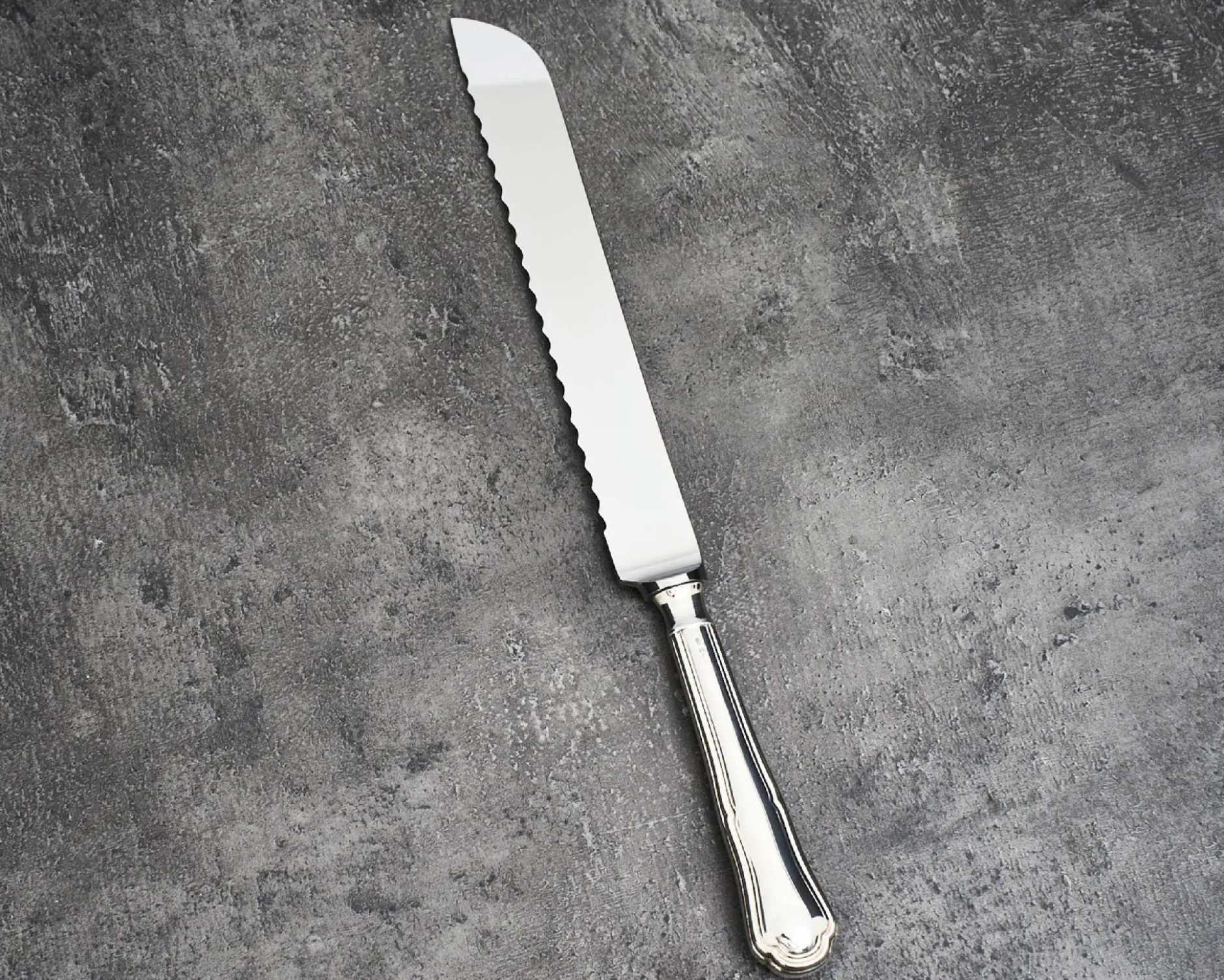 Coltello panettone argento in stile barocchino usato ricondizionato Zanolli vintage