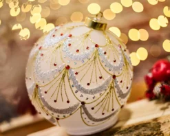 Idea regalo natale sfera girevole bianca oro e rossa con luce led Selezione zanolli