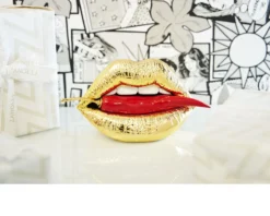 Scultura bocca oro e peperoncino rosso Selezione zanolli